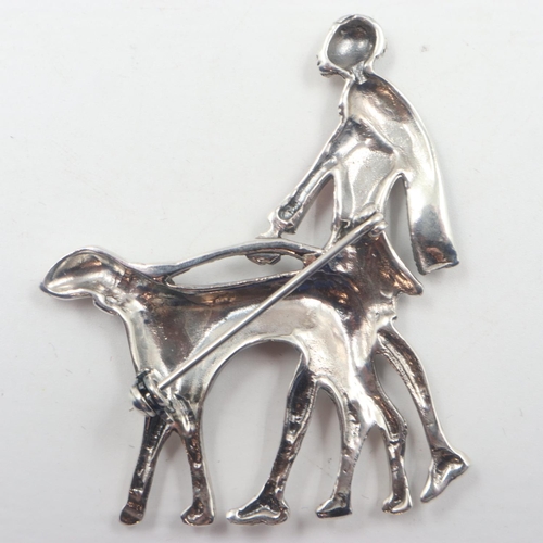 68 - White metal Art Deco style enamelled brooch, lady and dog, 13g. UK P&P Group 0 (£6+VAT for the first... 