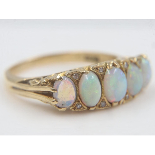 76 - 18ct gold, five opal and diamond ring, size T, 6.8g. UK P&P Group 1 (£16+VAT for the first lot and £... 