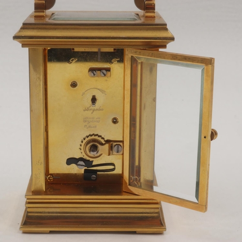 317 - Angelus modern brass cased carriage clock, working at lotting. UK P&P Group 2 (£20+VAT for the first... 