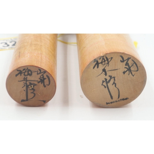 321 - Two mid century Kokeshi dolls, largest H: 25 cm. Not available for in-house P&P