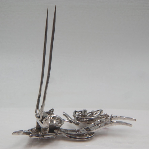 89 - Early 20th century platinum brooch, in the form of a bird of paradise, set with a multitude of diamo... 