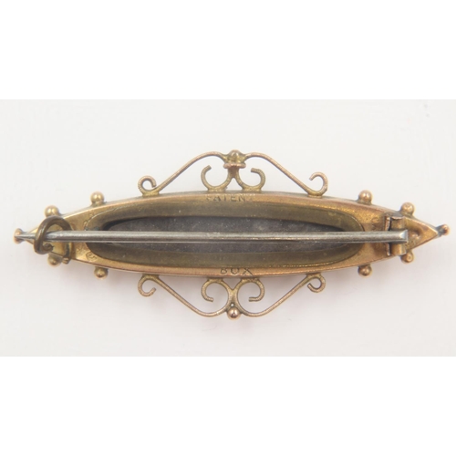 90C - Victorian 9ct gold mourning brooch, stone set, with glass back, L: 45mm, 4.0g. UK P&P Group 0 (£6+VA... 