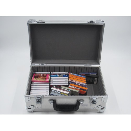 997 - Carry case containing blank and pre-recorded cassettes. UK P&P Group 3 (£30+VAT for the first lot an... 