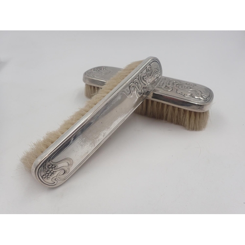 117 - Two Art Nouveau W.M.F brushes and a matching hand mirror (a/f). UK P&P Group 1 (£16+VAT for the firs... 