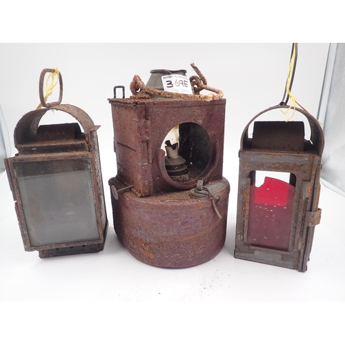 369E - Three railway warning/tail lamps for refurbishment, height of tallest H: 28cm. Not available for in-... 