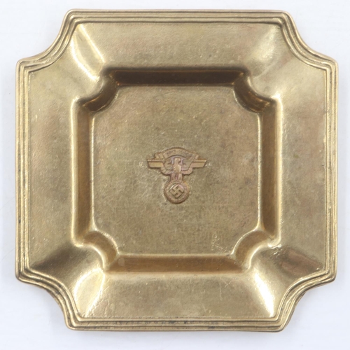 2058 - Early Third Reich brass ashtray displaying an NSKK Brass Badge. UK P&P Group 1 (£16+VAT for the firs... 