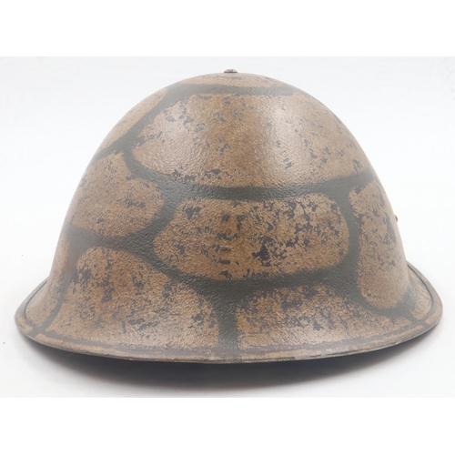 2093 - British 1944 Pattern Turtle helmet, painted in Maltese Rubble camouflage. Malta was one of the heavi... 