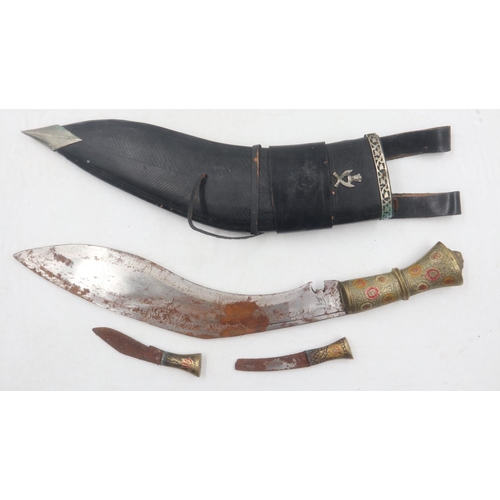 2109 - Gurkha kukri with ornate brass grip, with tools in sheath surmounted with Gurkha badge. UK P&P Group... 