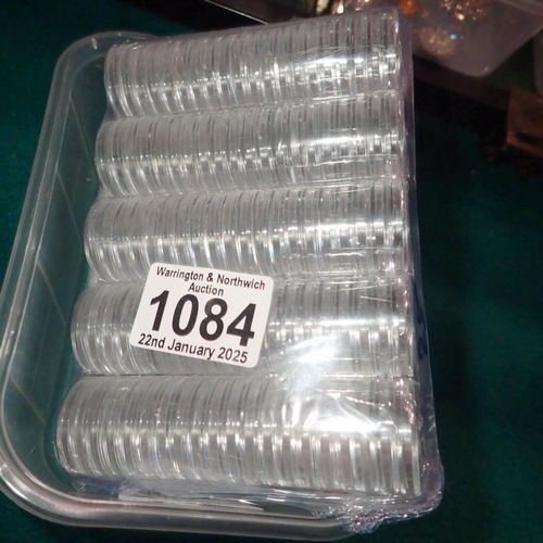 1084 - Cased set of 100 coin capsules - unused. UK P&P Group 1 (£16+VAT for the first lot and £2+VAT for su... 