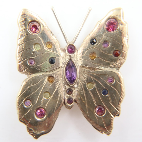 19 - Heavy gauge 9ct gold butterfly brooch, set with various gemstones; tourmaline, amethyst and Citrine,... 