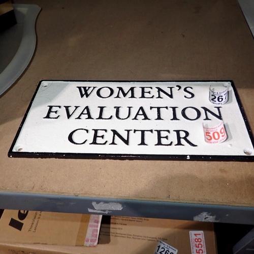 1267 - Cast iron Womens Evaluation centre sign. UK P&P Group 2 (£20+VAT for the first lot and £4+VAT for su... 