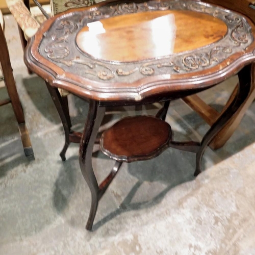 1679 - Carved mahogany coffee table, 47 x 72 x 70 cm. Not available for in-house P&P