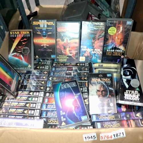 1871 - Fifty mixed Star Trek VHS tapes and a Star Wars trilogy box set. Not available for in-house P&P