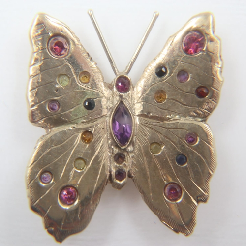 19 - Heavy gauge 9ct gold butterfly brooch, set with various gemstones; tourmaline, amethyst and Citrine,... 