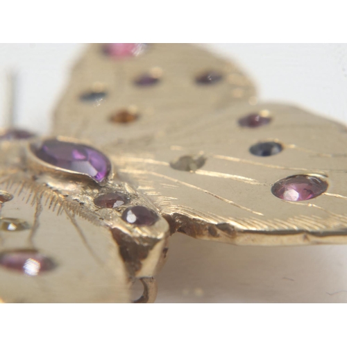 19 - Heavy gauge 9ct gold butterfly brooch, set with various gemstones; tourmaline, amethyst and Citrine,... 