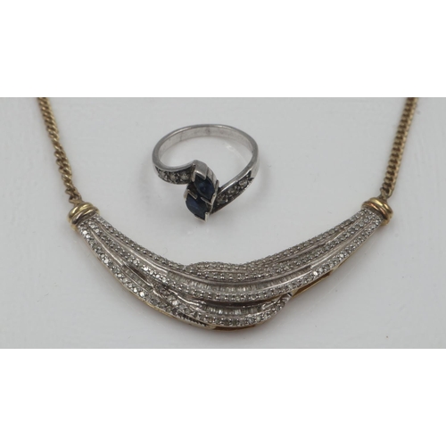 26 - 925 silver crescent shaped diamond-set necklace, L: 44 cm, and a sapphire-set silver ring, size K. U... 