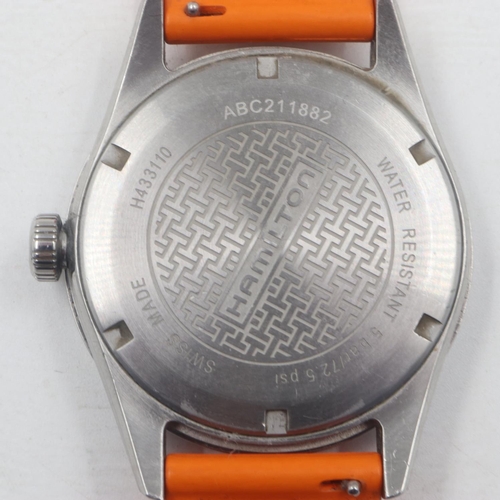 42 - HAMILTON: gents steel cased wristwatch, with baton and Arabic chapters against a two-tone blue and g... 