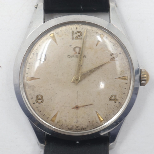 55 - OMEGA: 1960s gents steel cased manual wind wristwatch, champagne coloured dial with baton and Arabic... 