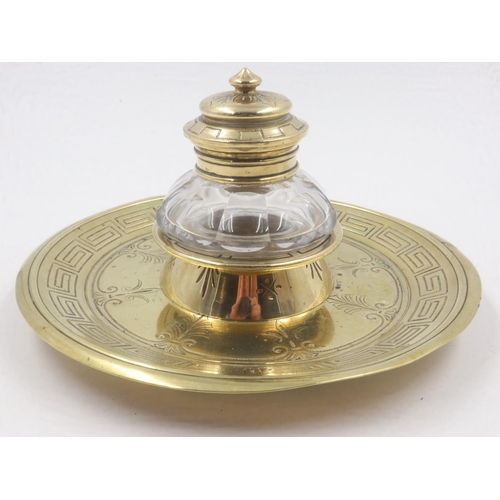 73 - Victorian brass inkwell with glass reservoir and circular tray. UK P&P Group 2 (£20+VAT for the firs... 