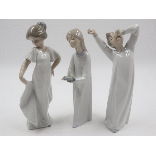 219 - Two Lladro and one Nao figurines. UK P&P Group 2 (£20+VAT for the first lot and £4+VAT for subsequen... 