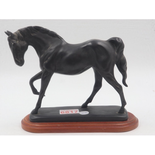 233 - Bronze effect horse figurine on wooden base. UK P&P Group 2 (£20+VAT for the first lot and £4+VAT fo... 