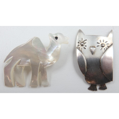 11 - 925 silver owl brooch and a Bethlehem mother of pearl camel brooch. UK P&P Group 0 (£6+VAT for the f... 