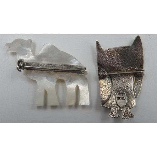 11 - 925 silver owl brooch and a Bethlehem mother of pearl camel brooch. UK P&P Group 0 (£6+VAT for the f... 