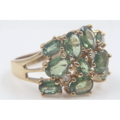 23 - 9ct gold, green sapphire and diamond set cluster ring, 5.3g, size R. UK P&P Group 0 (£6+VAT for the ... 