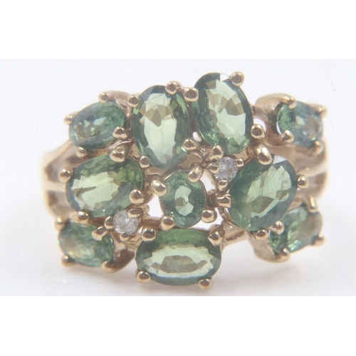 23 - 9ct gold, green sapphire and diamond set cluster ring, 5.3g, size R. UK P&P Group 0 (£6+VAT for the ... 