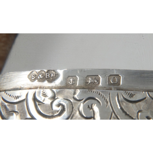 67 - Hallmarked silver card case with engraved decoration, maker S&BM, Birmingham assay, 32g. UK P&P Grou... 