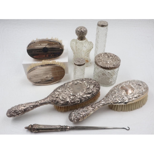 76 - Silver backed dressing table brushes and four silver top jars. UK P&P Group 2 (£20+VAT for the first... 