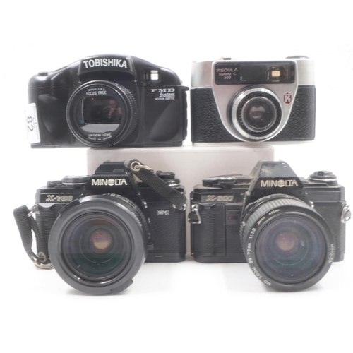 82 - Case containing four 35mm cameras including Minolta. UK P&P Group 2 (£20+VAT for the first lot and £... 