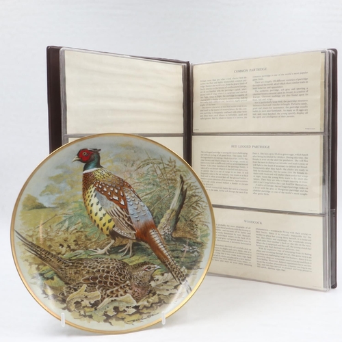 142 - 11/12 Franklin mint game birds of the world plates. Not available for in-house P&P