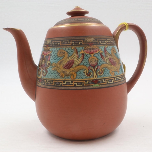 165 - In the manner of Dr Christopher Dresser for Watcombe Pottery, a terracotta teapot and cover decorate... 