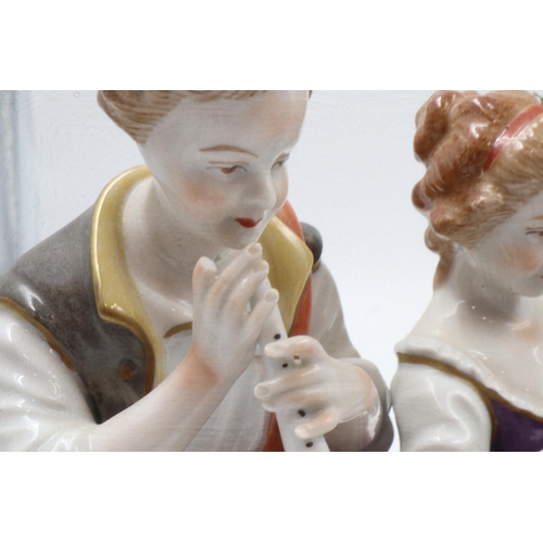 176 - Three porcelain continental figural groups. Not available for in-house P&P