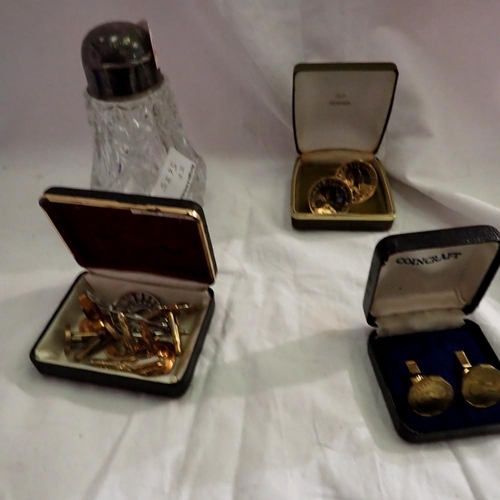 1190 - Selection of cufflinks, coins and a silver topped jar. Not available for in-house P&P