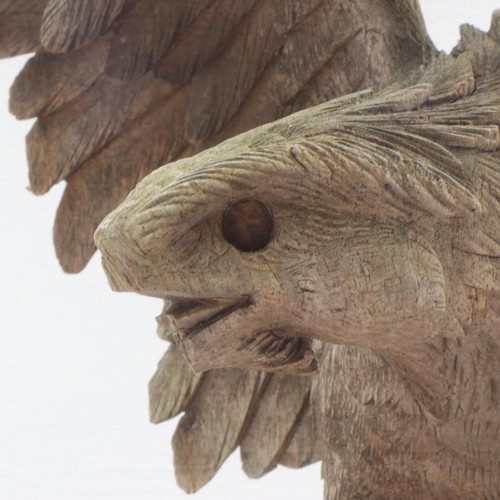 219 - Carved wooden model of eagle on carved base. H: 23cm. UK P&P Group 3 (£30+VAT for the first lot and ... 