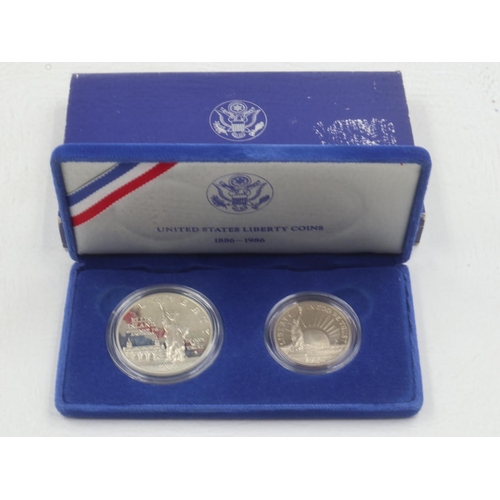 2064 - Boxed United States Liberty coins 1886-1986 dollar and half dollar. UK P&P Group 1 (£16+VAT for the ... 