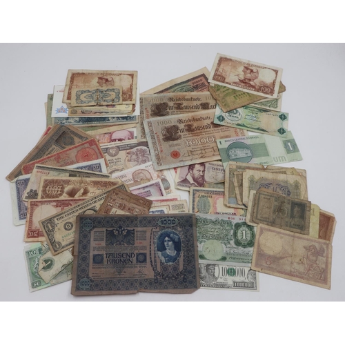 2258 - Seventy-five mixed world banknotes, including UK territories, mixed grades. UK P&P Group 1 (£16+VAT ... 