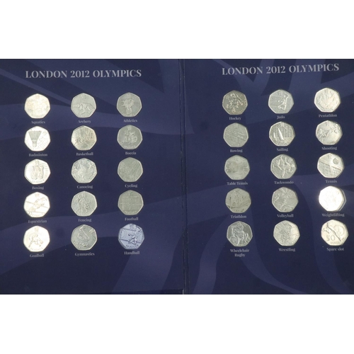 2411 - London 2012 Olympics set of thirty 50p coins within folder, lacking one coin (Handball). UK P&P Grou... 