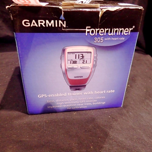 1025 - Two Garmin Forerunner 305 sport watches and chargers. Not available for in-house P&P