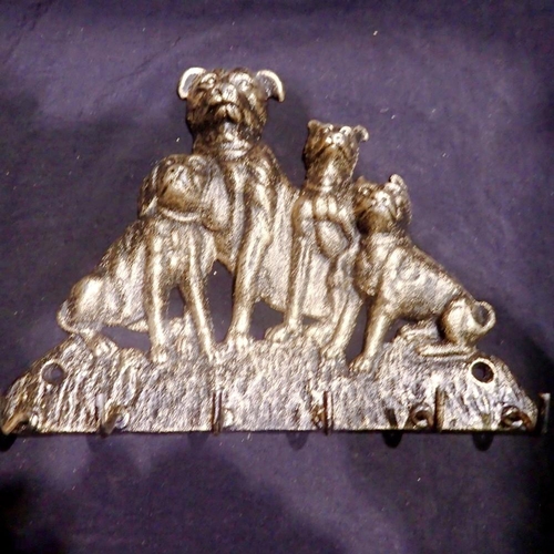 1034 - Cast iron key rack, six hooks, four dogs, H: 16 cm. UK P&P Group 1 (£16+VAT for the first lot and £2... 