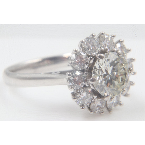 30 - 18ct white gold diamond-set cocktail ring, centre diamond 2cts, surrounded by a further 1.50cts, tot... 