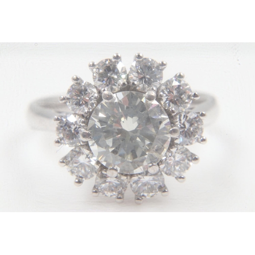 30 - 18ct white gold diamond-set cocktail ring, centre diamond 2cts, surrounded by a further 1.50cts, tot... 