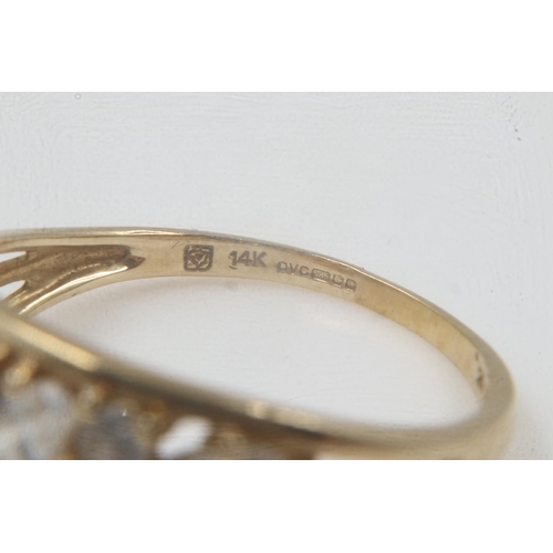 32 - 14ct gold pierced ring set with CZ, size U, 3.1g. UK P&P Group 0 (£6+VAT for the first lot and £1+VA... 