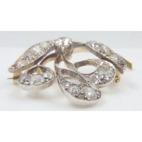 33 - Late 19th century old-cut diamond set 15ct gold floral brooch, totalling approximately 4cts, 35 x 35... 