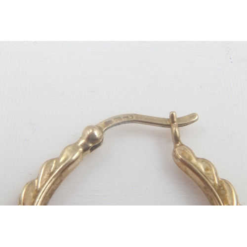 41 - Pair of 9ct gold angel form hoop earrings, each H: 30 mm, combined 2.4g. UK P&P Group 0 (£6+VAT for ... 