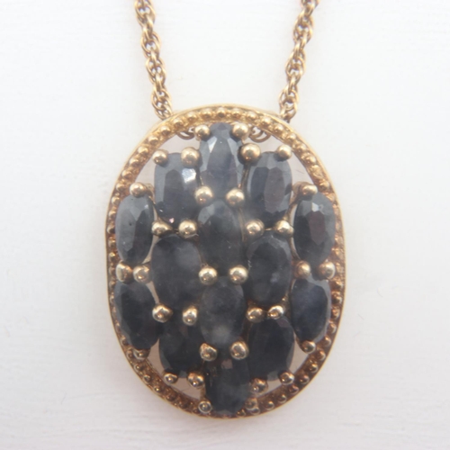 6 - Gilt washed silver pendant set with fourteen sapphires on a silver gilt chain. UK P&P Group 0 (£6+VA... 