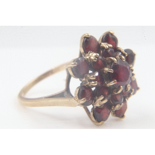 9 - 9ct gold garnet set cluster ring, size P, 5.0g. UK P&P Group 0 (£6+VAT for the first lot and £1+VAT ... 