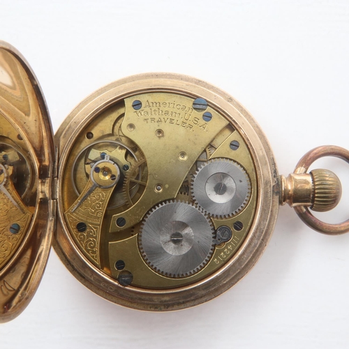 87 - WALTHAM: crown wind full hunter gold plated pocket watch with subsidiary seconds dial, working at lo... 